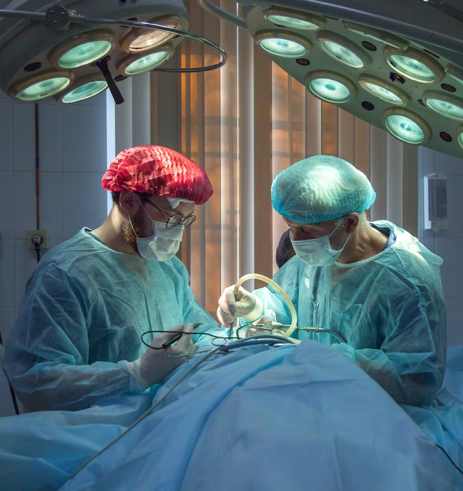 two surgeons performing surgery in an operating room.