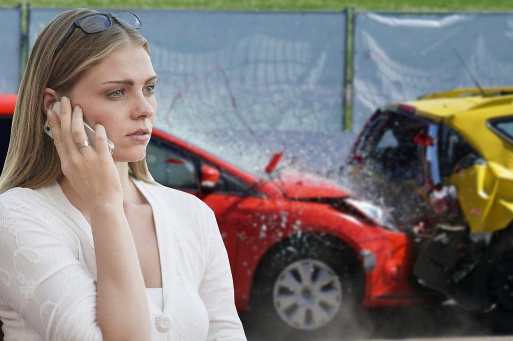 woman on the phone after a car crash