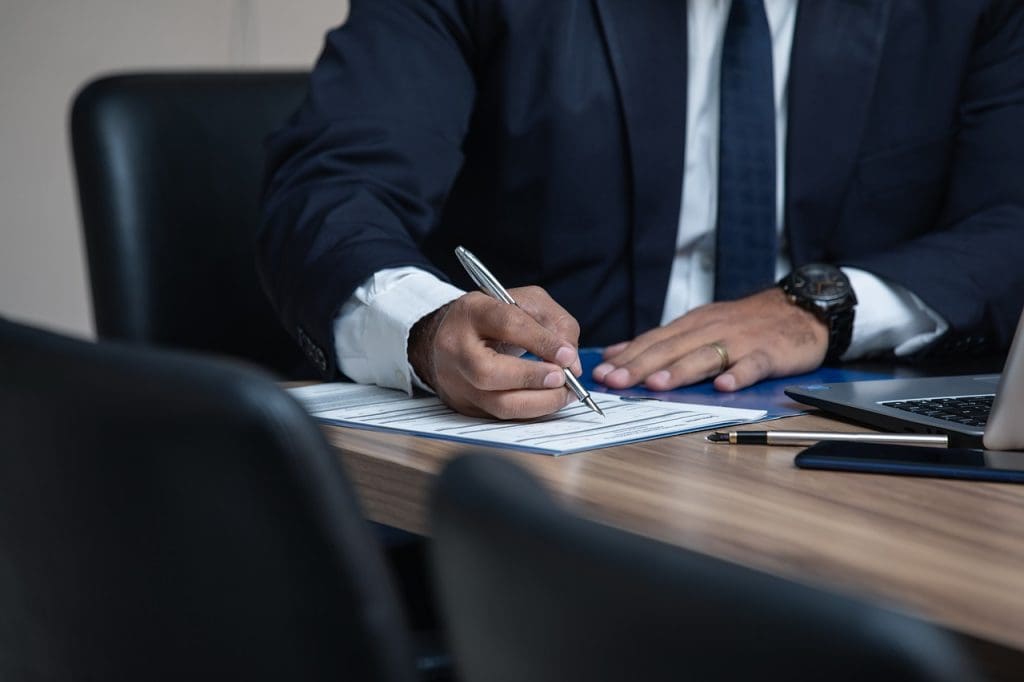 Lawyer at a desk working on paperworkd