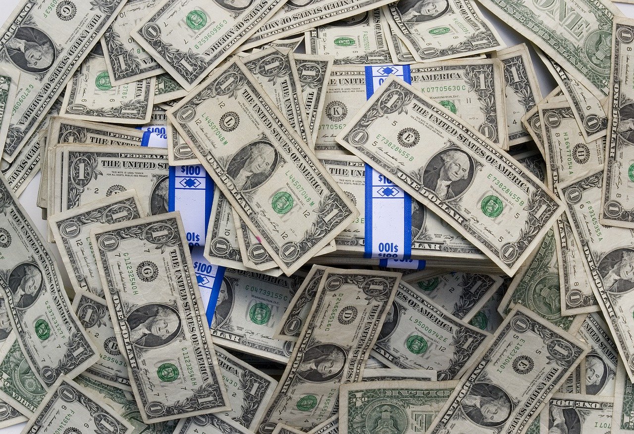 Pile of one dollar bills