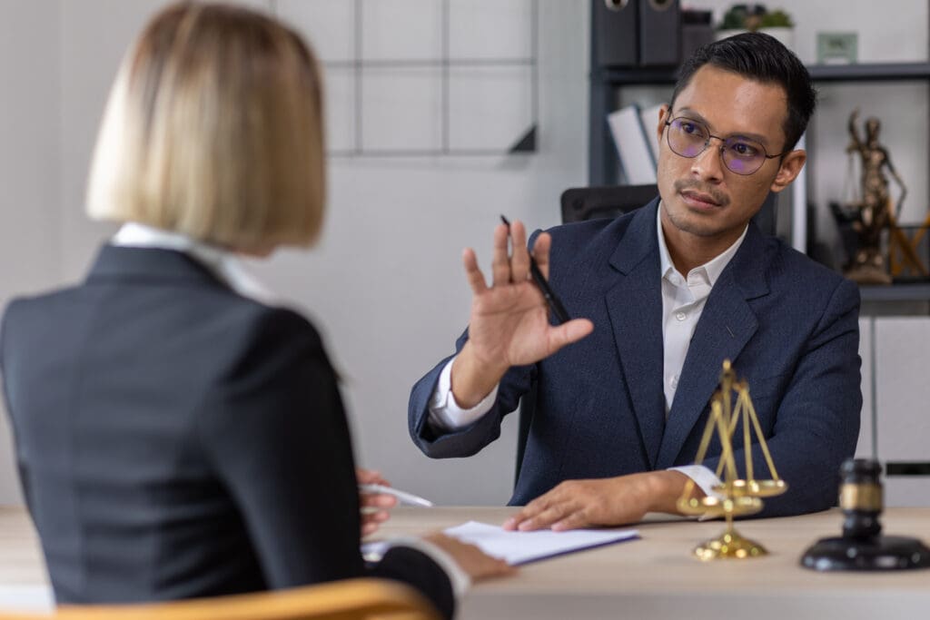 lawyer talking to client