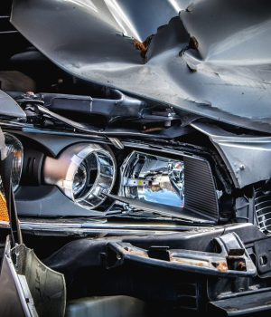 Close up of a car front bumper after an accident